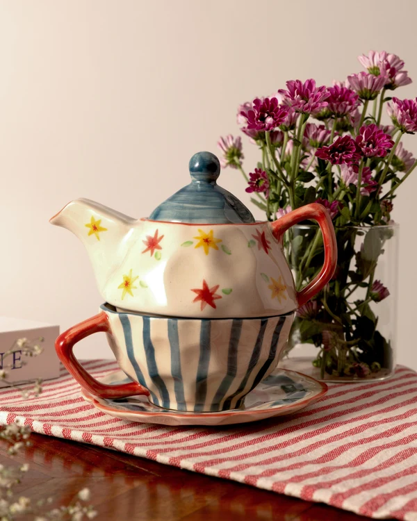 Hand-painted tea-for-one set with floral design, by The Indian Rose
